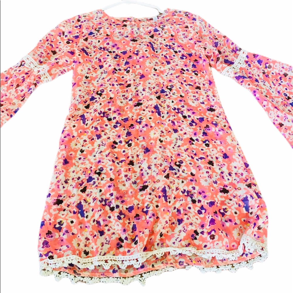 A girls pink and purple dress.